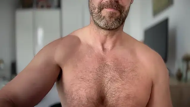 Mr_Beef momentopname van live room op Stripchat